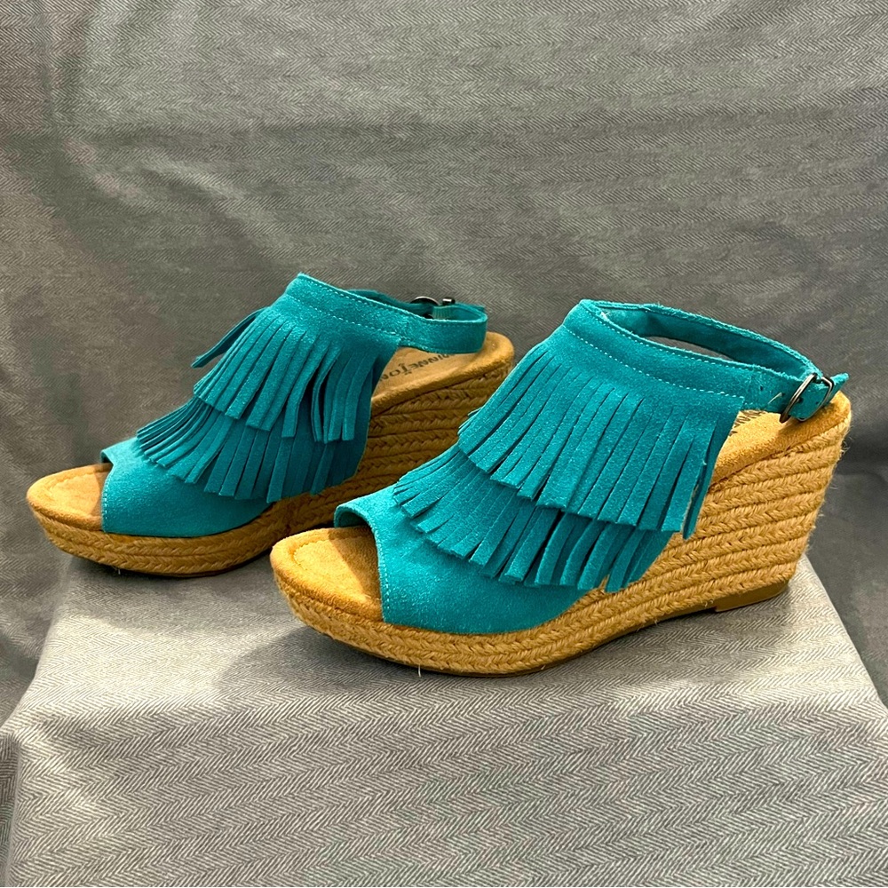 Turquoise Minnetonka fringe wedges